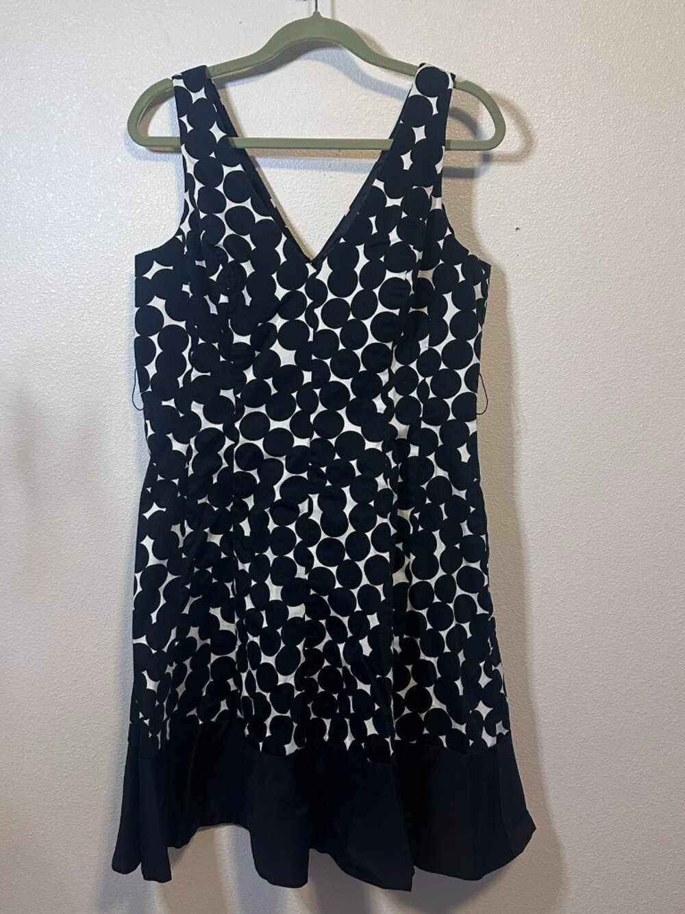 Jones New York black and white polka dot dress with ruffle hem